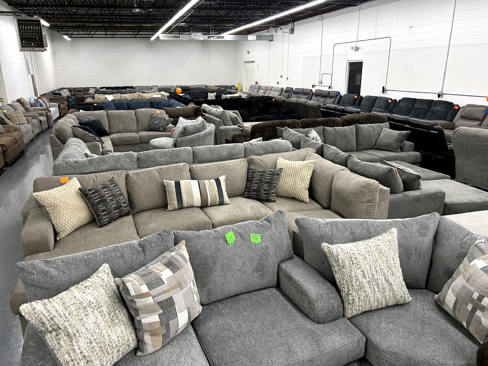 BoxDrop Rockford showroom floor filled with sofas and sectionals